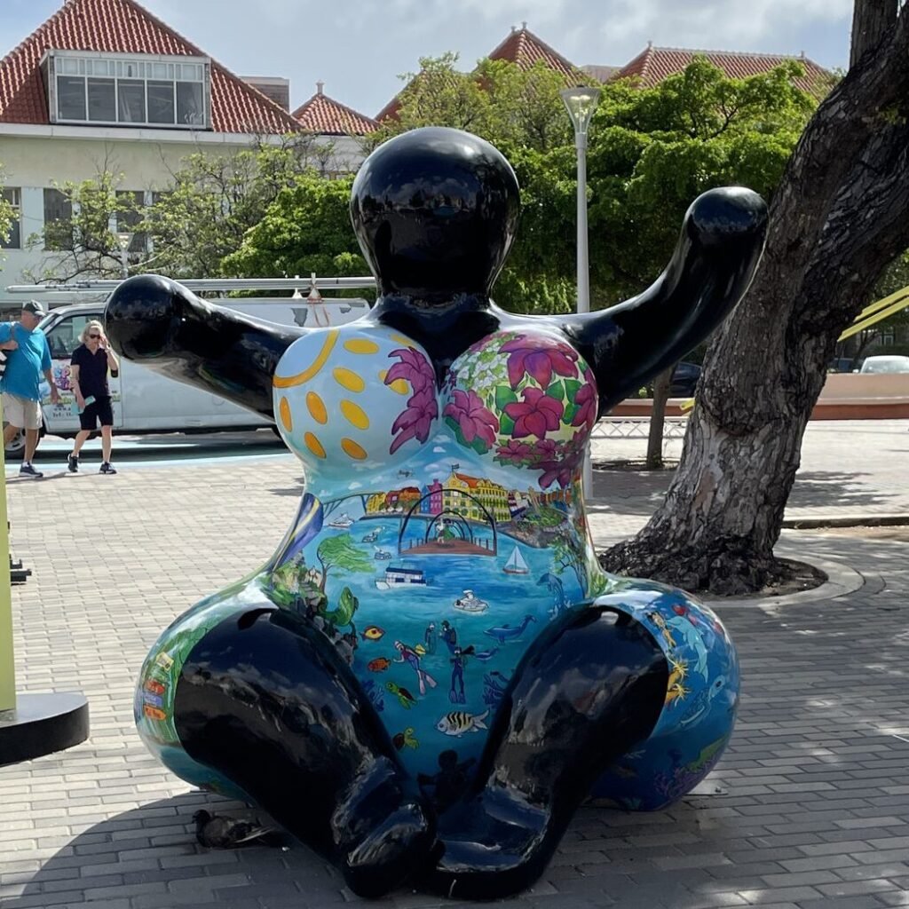 Colorful painted statue on the Handelskade waterfront in Willemstad, Curacao